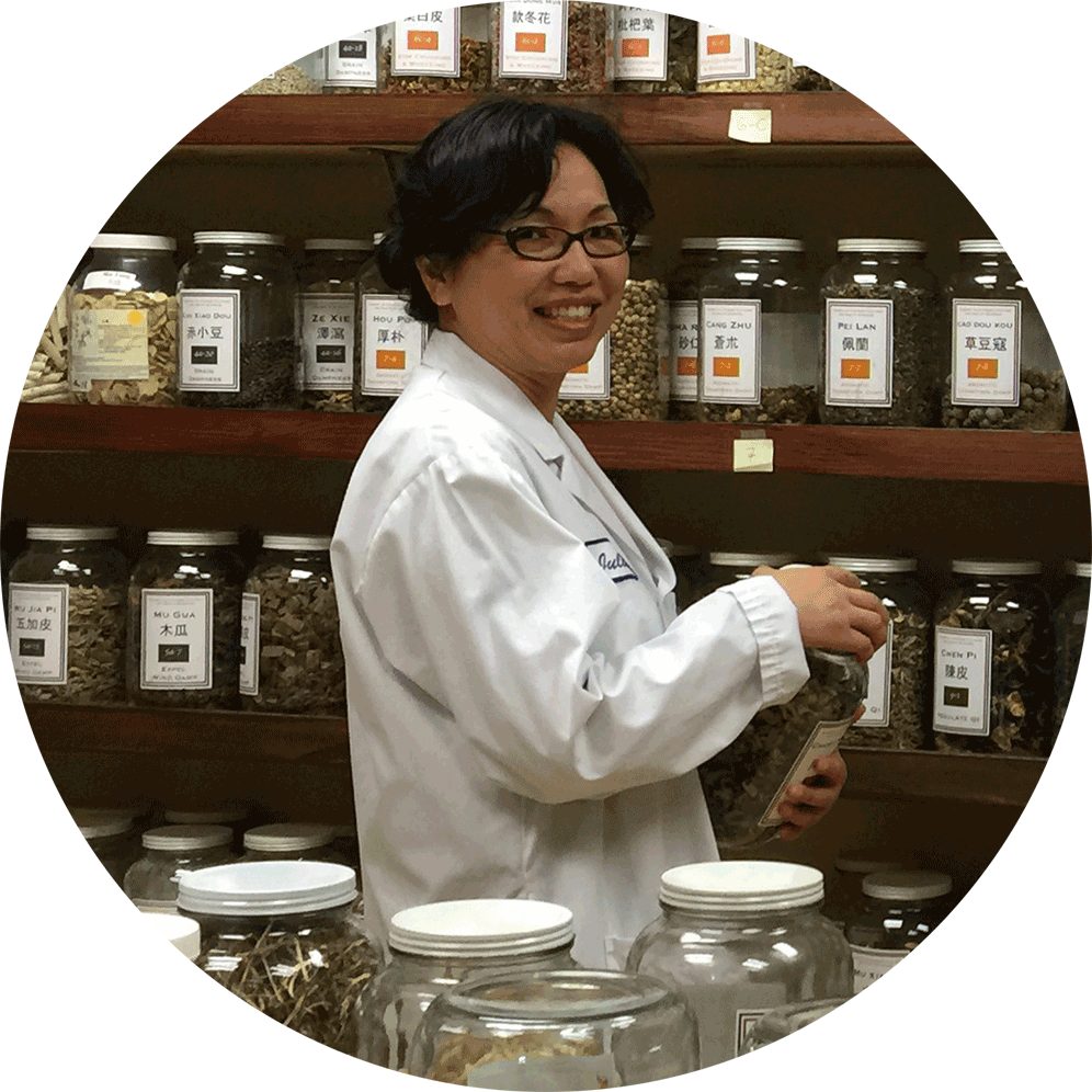portrait of Julie Wang, Licensed Acupuncturist, Certified by National Certification Commission for Acupuncture and Oriental Medicine